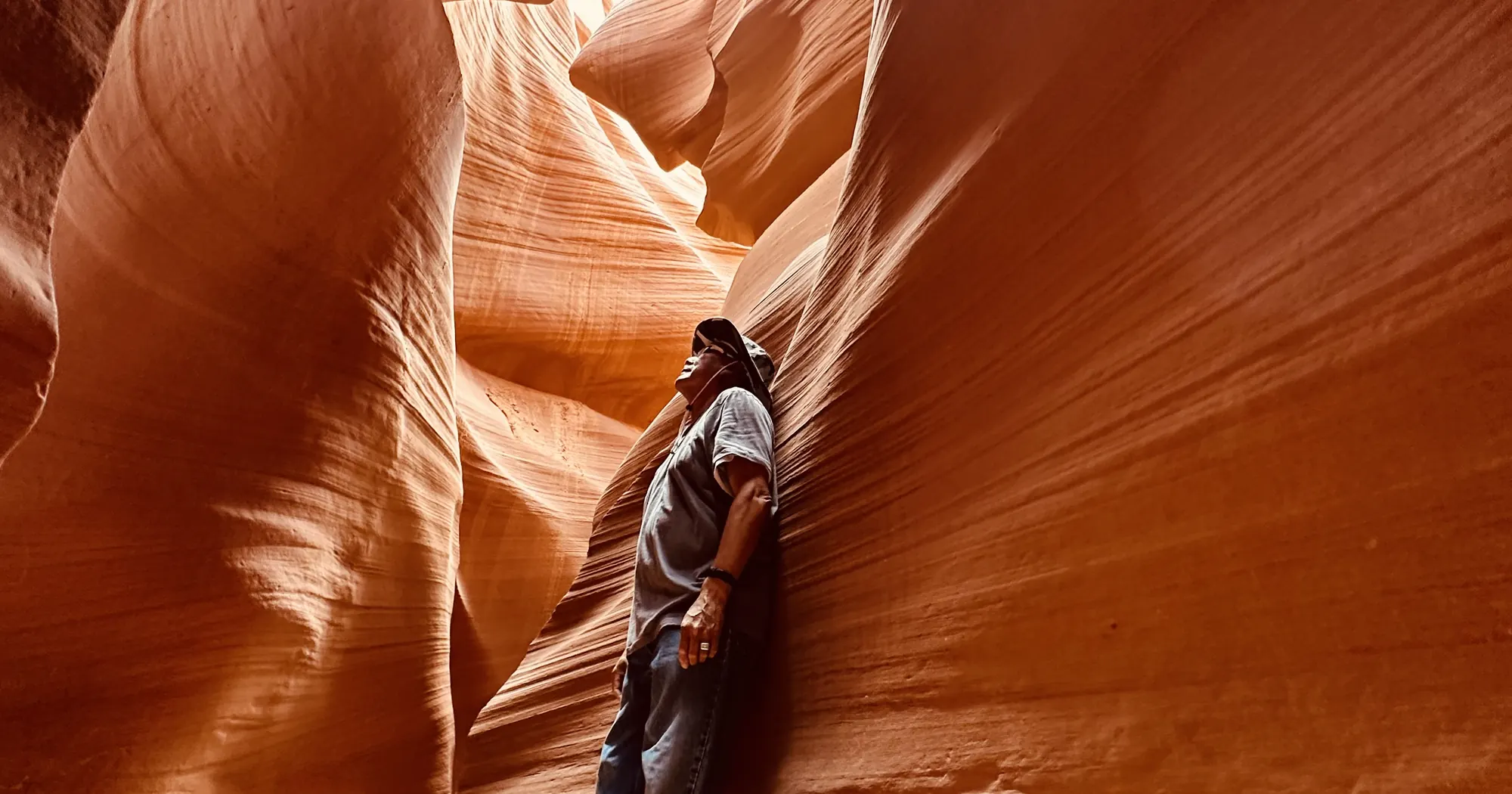 Light falling down the curved walls of Lower Antelope Canyon